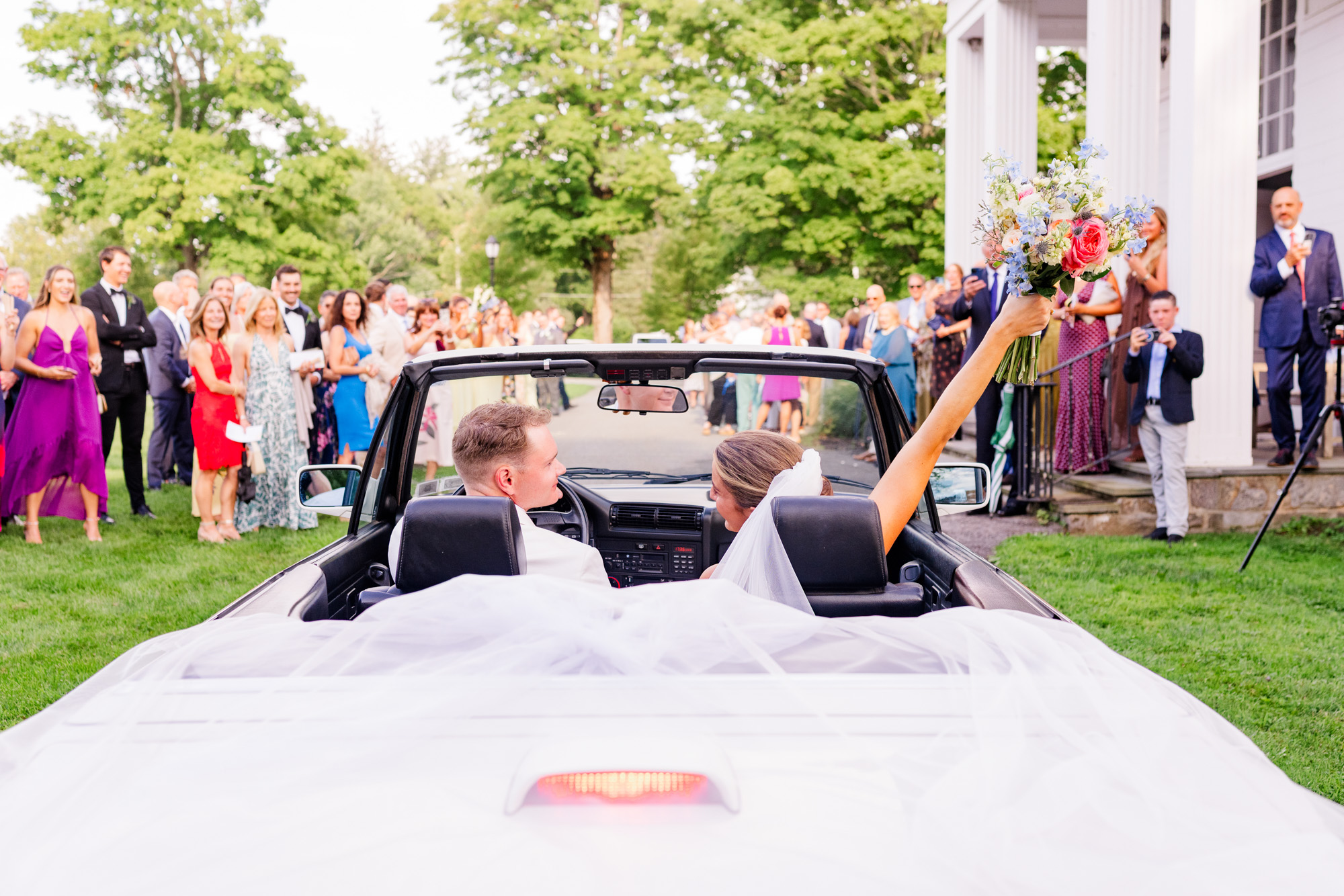 couple in BMW getaway car