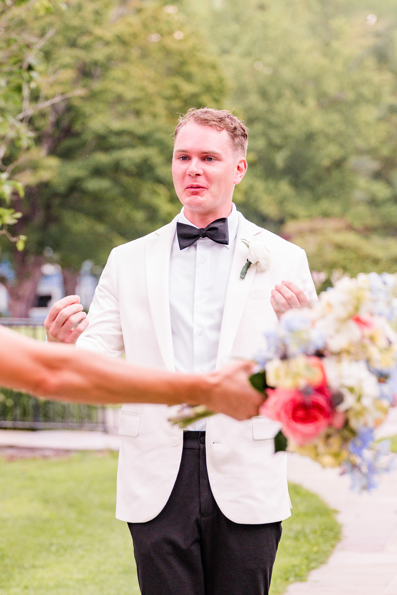 groom looking very happy at first look
