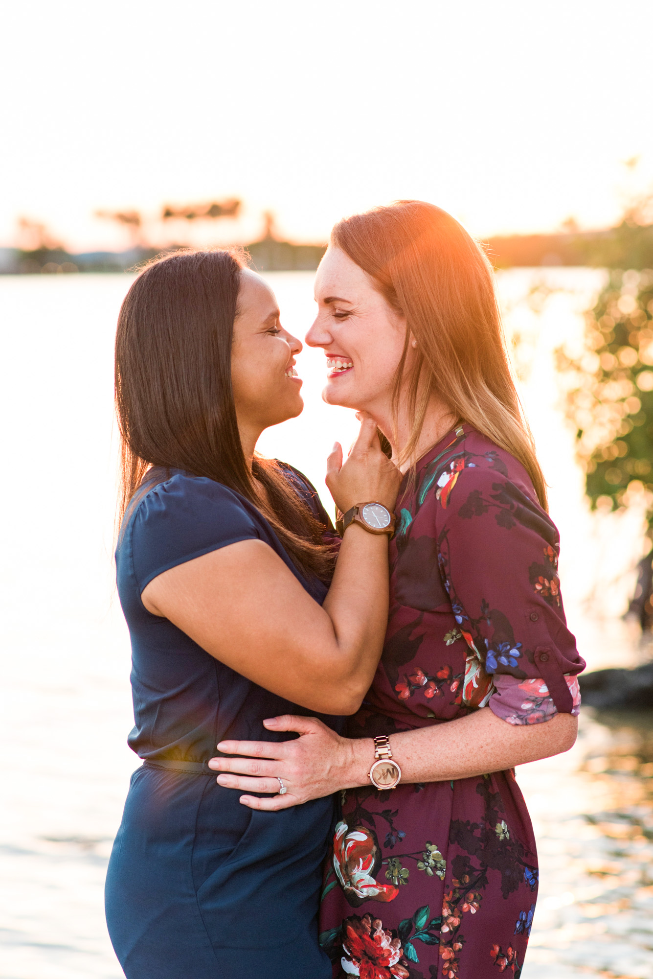 two women holding each other at their engagement session in Vero Beach