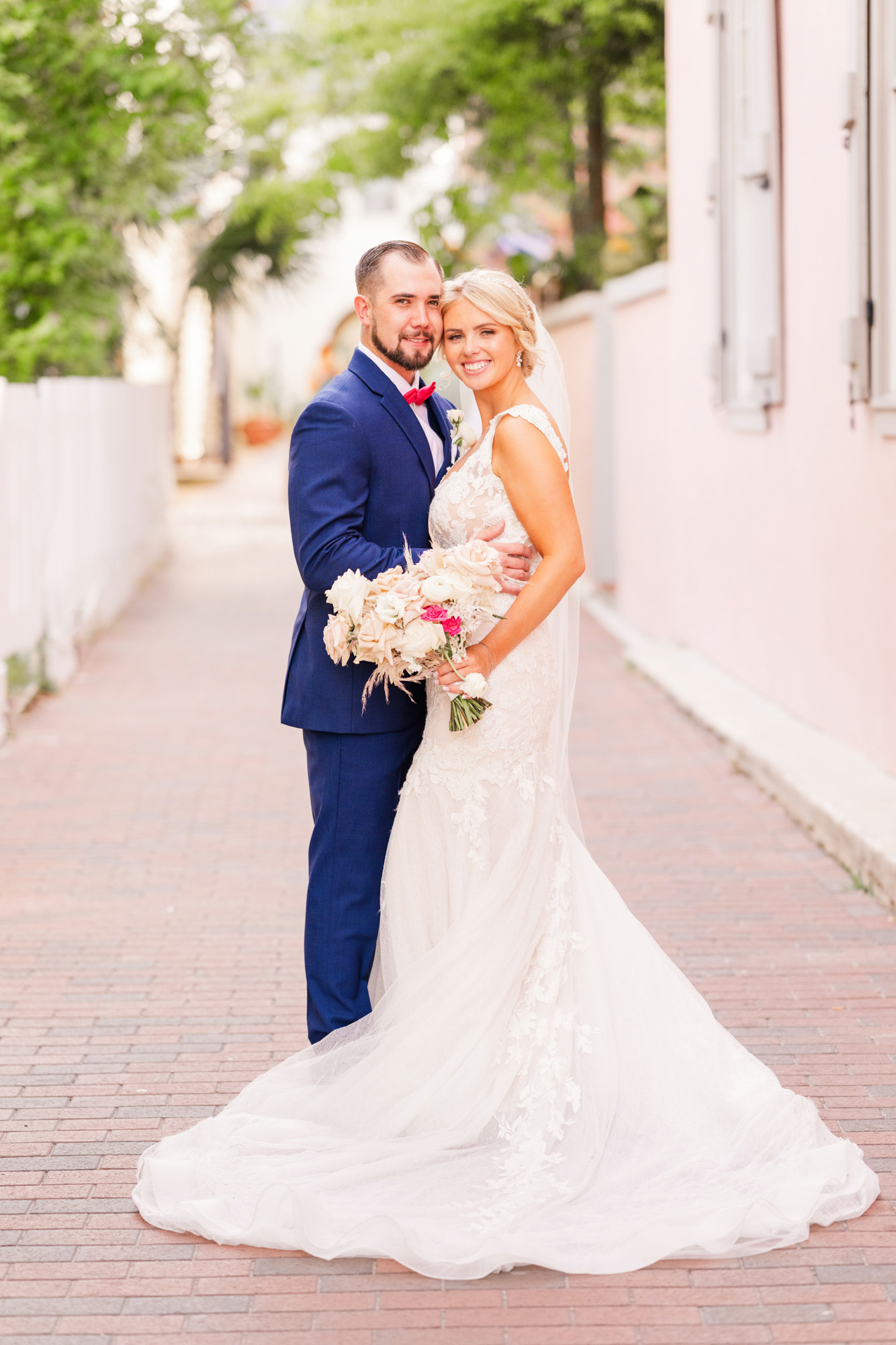 couple embracing in the alley by The White Room in St. Augustine