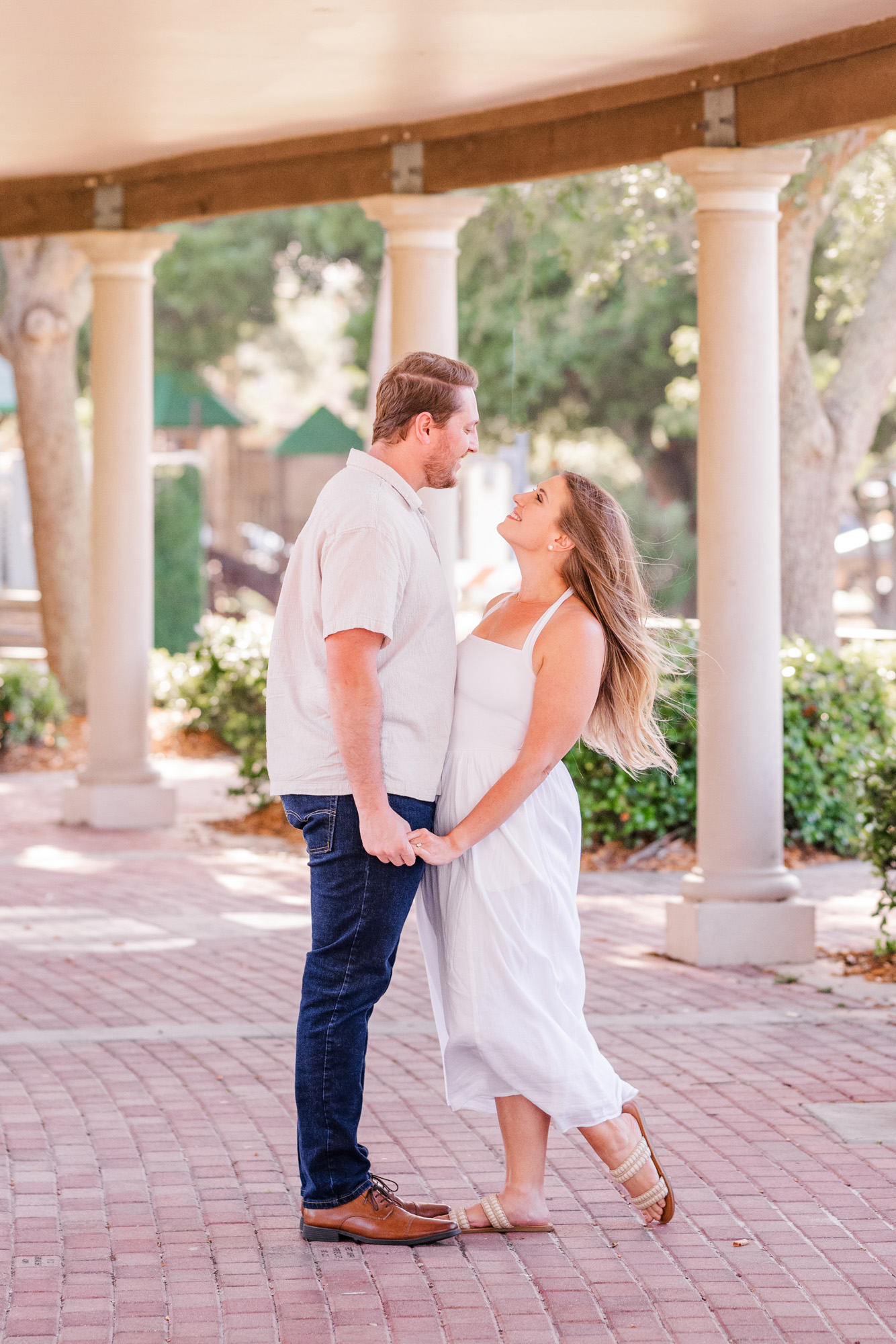 Man and woman during their Cocoa Village engagement session