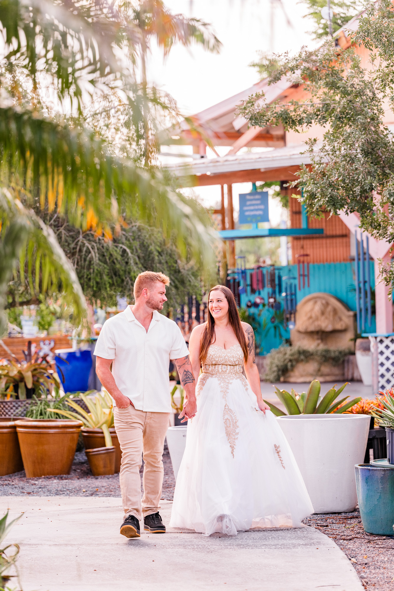 Couple holding hands and walking at Rockledge Gardens