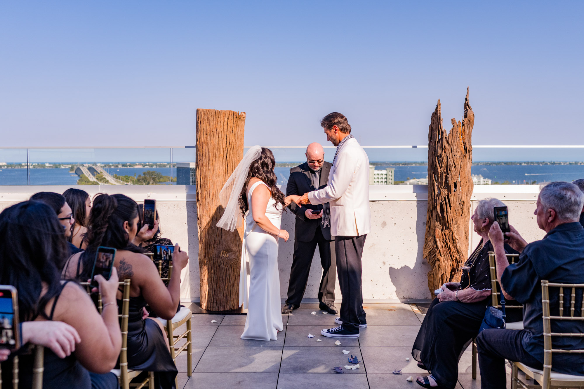 Couple getting married outside on the deck at Hotel Melby.