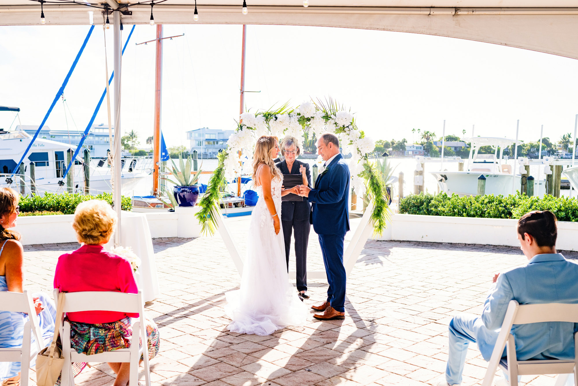 Bride and goom wedding ceremony at the Eau Gallie Yacht Club