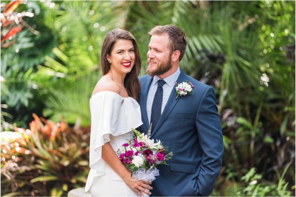 bride and groom laughing at Florida Tech Botanical Gardens Wedding