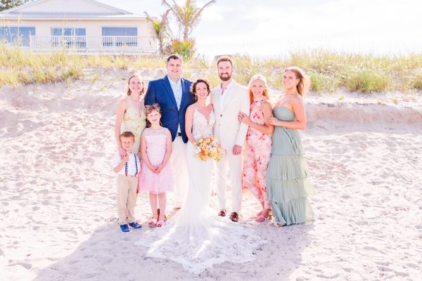 Family portrait with dunes in the background
